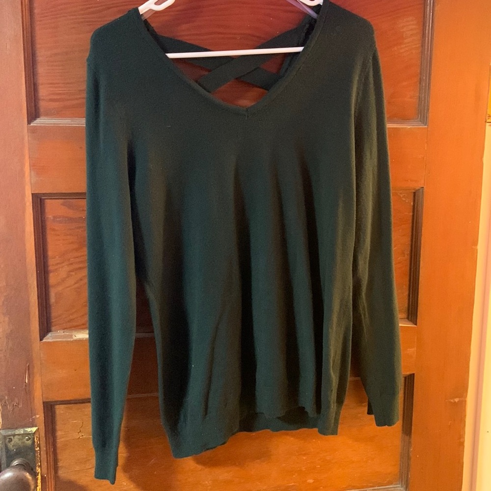 Long sleeve dark green with a low cris cross in the back